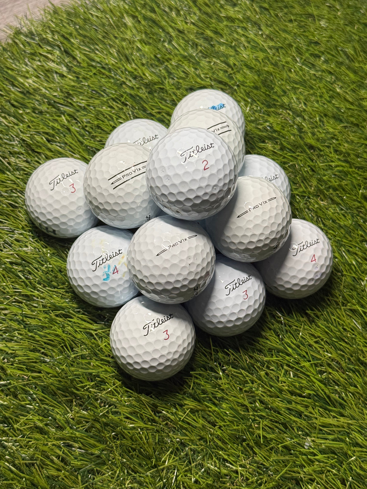 A/pearl grade Titleist Pro V1x golf balls on the fairway