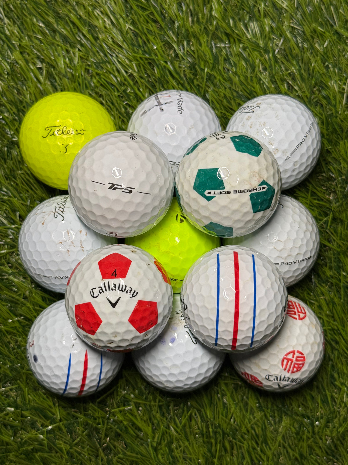 Mixed premium golf balls showing B and C grade condition