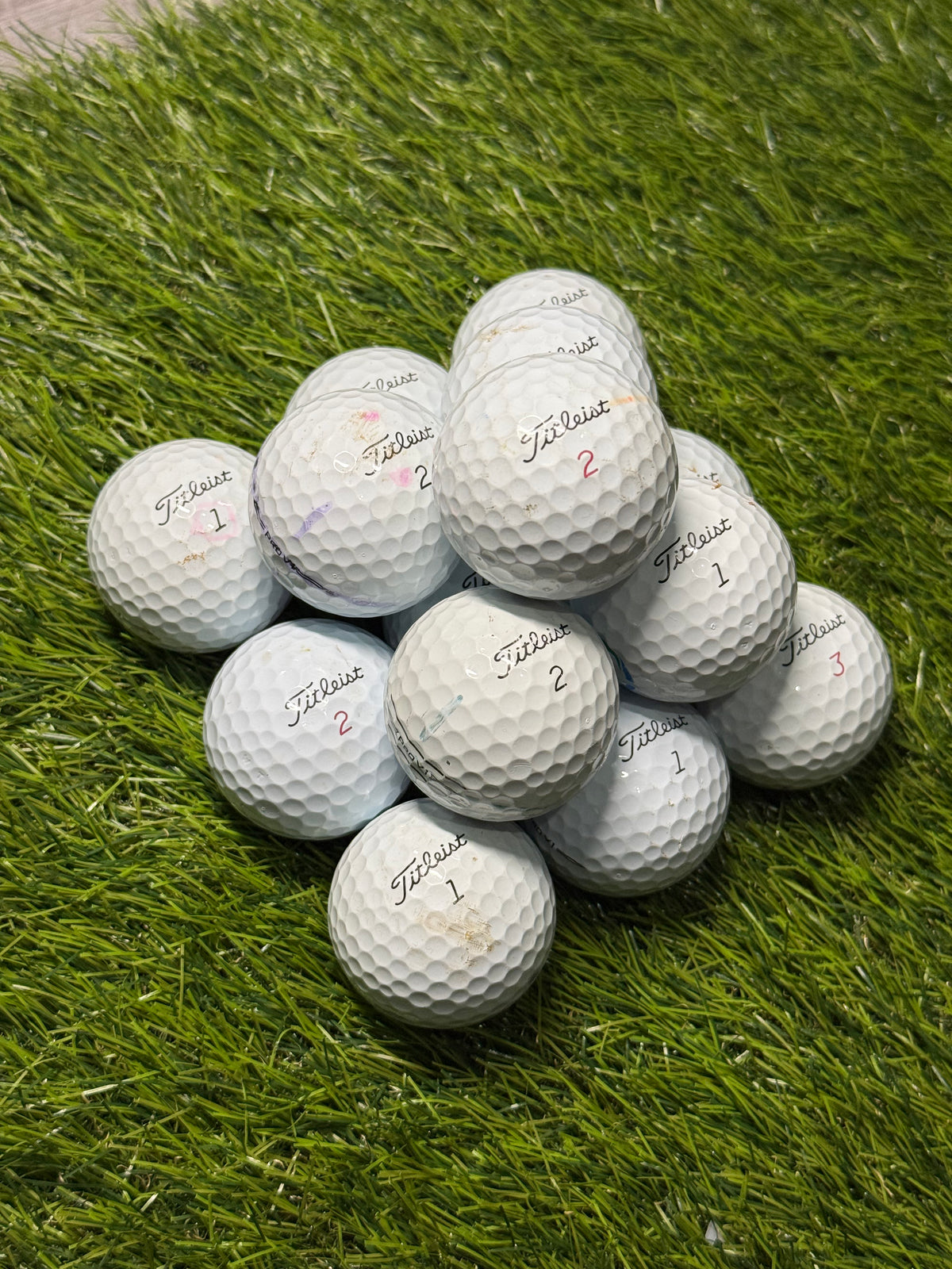 Used B-grade Titleist Pro V1 golf balls on the fairway
