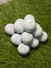 Used B-grade Titleist Pro V1 golf balls on the fairway