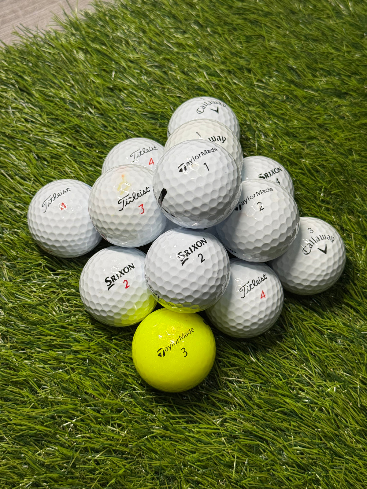 A-grade premium brand golf balls including Titleist, Callaway and Srixon