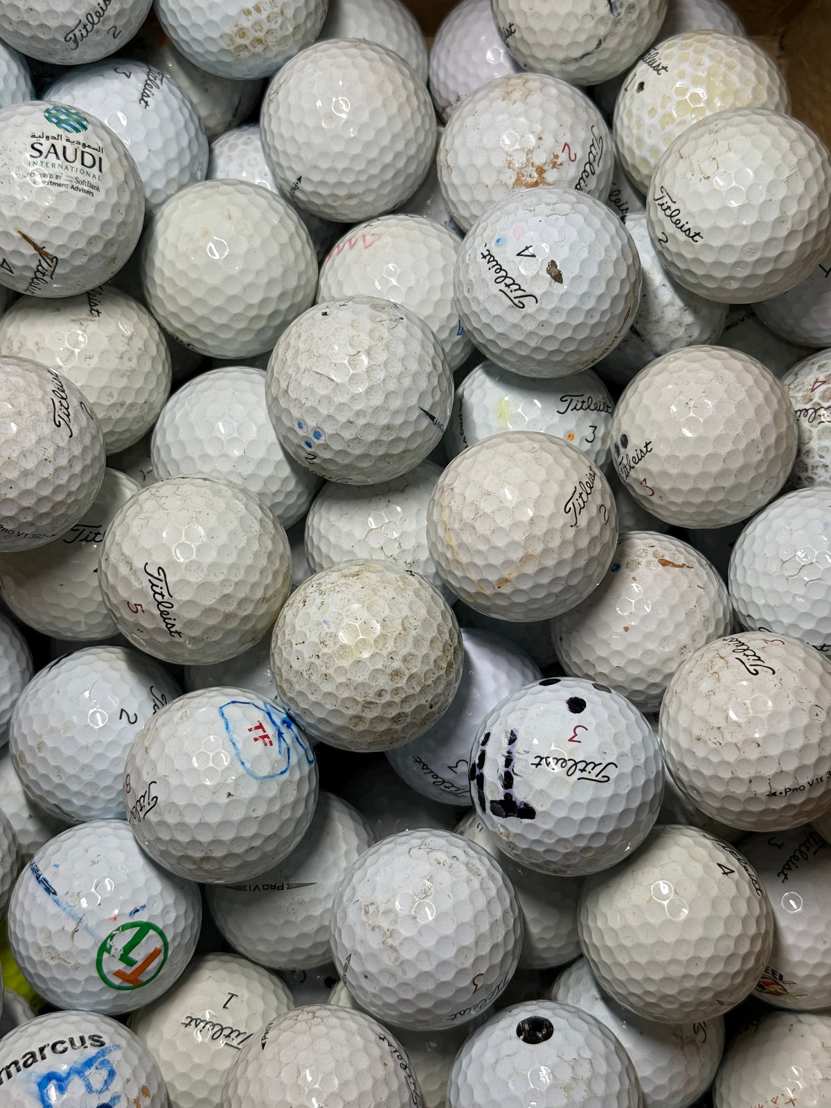 Tray of C-grade Titleist Pro V1 golf balls