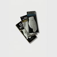 Premium tour-standard cabretta leather golf glove in retail packaging
